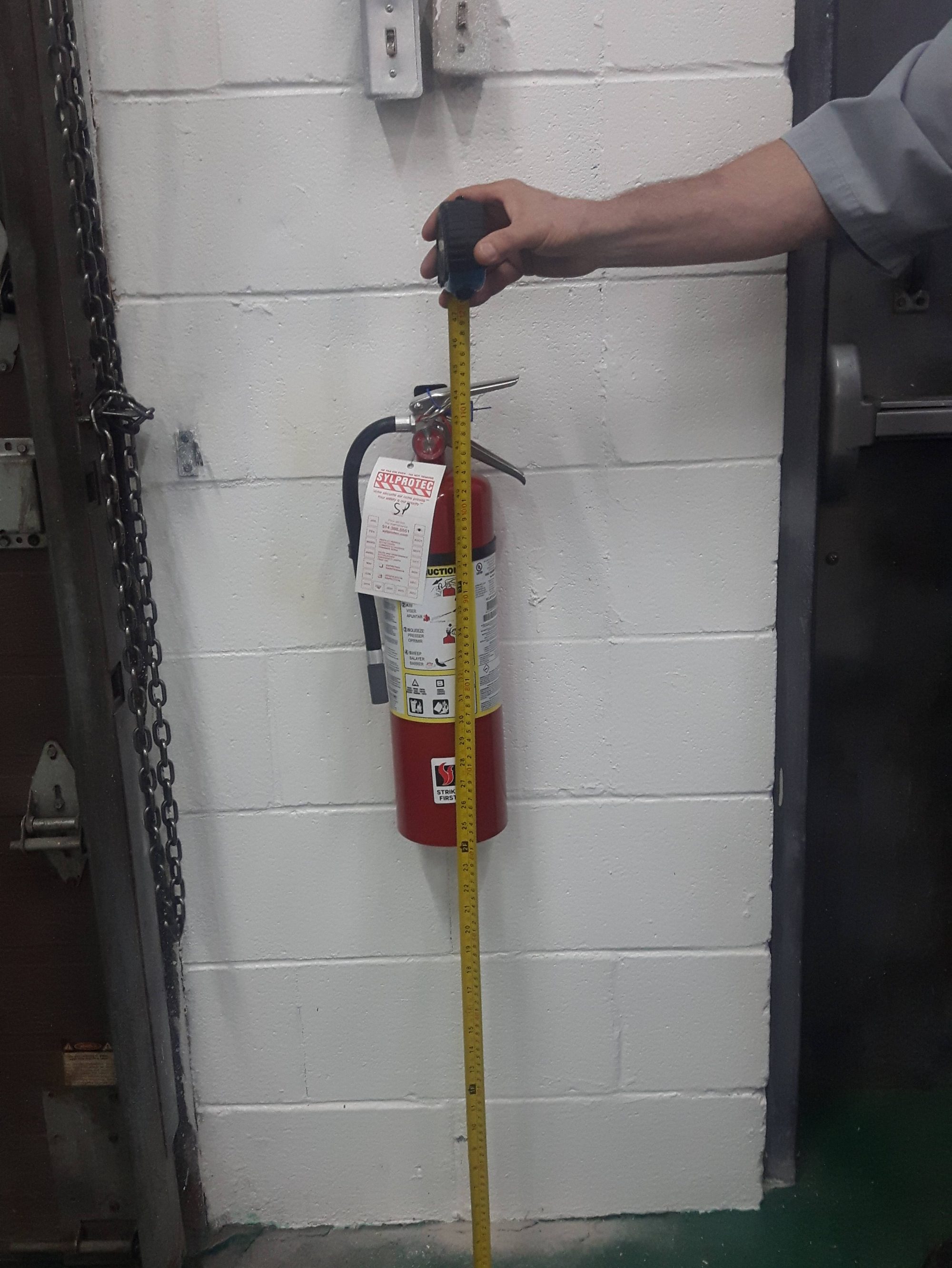 The rules regarding the height at which your portable fire extinguishers must be attached.